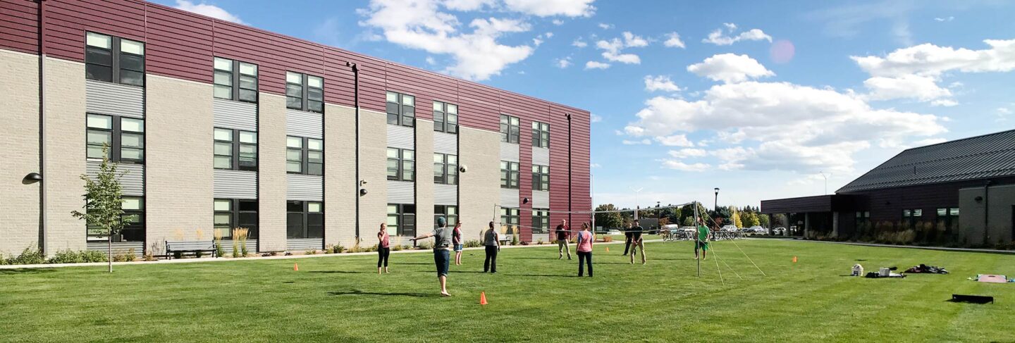 students playing volleyball