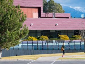 a student walks on campus