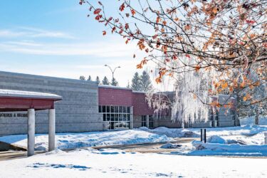 sun shining down on the snowy kalispell campus