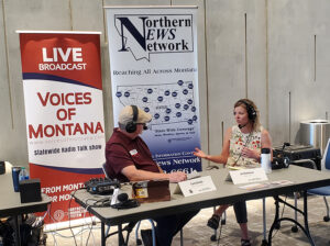 two people talking during a radio interview