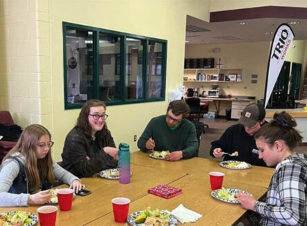 students sitting at table